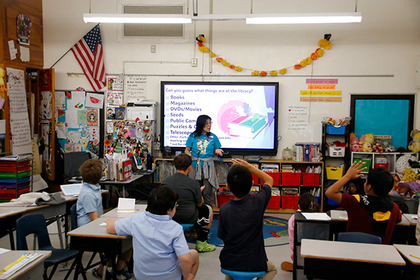 A woman talks to students about being a librarian